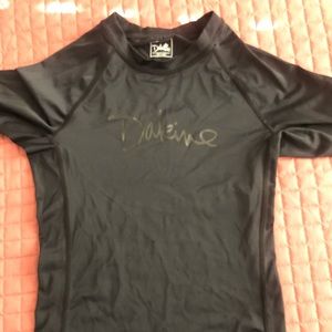 Women’s medium Dakine surf rash guard